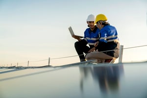 specialist-technician-professional-engineer-with-laptop-tablet-maintenance-checking-installing-solar-roof-panel-factory-rooftop-sunlight-engineers-team-survey-check-solar-panel-roof